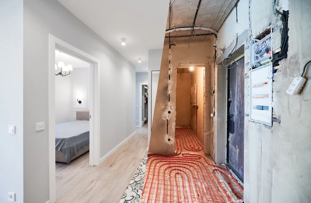 A before and after split view of a hallway renovation, showcasing Superior Paint & Remodeling LLC's expertise in drywall, flooring installation, and interior painting for Kansas City properties.