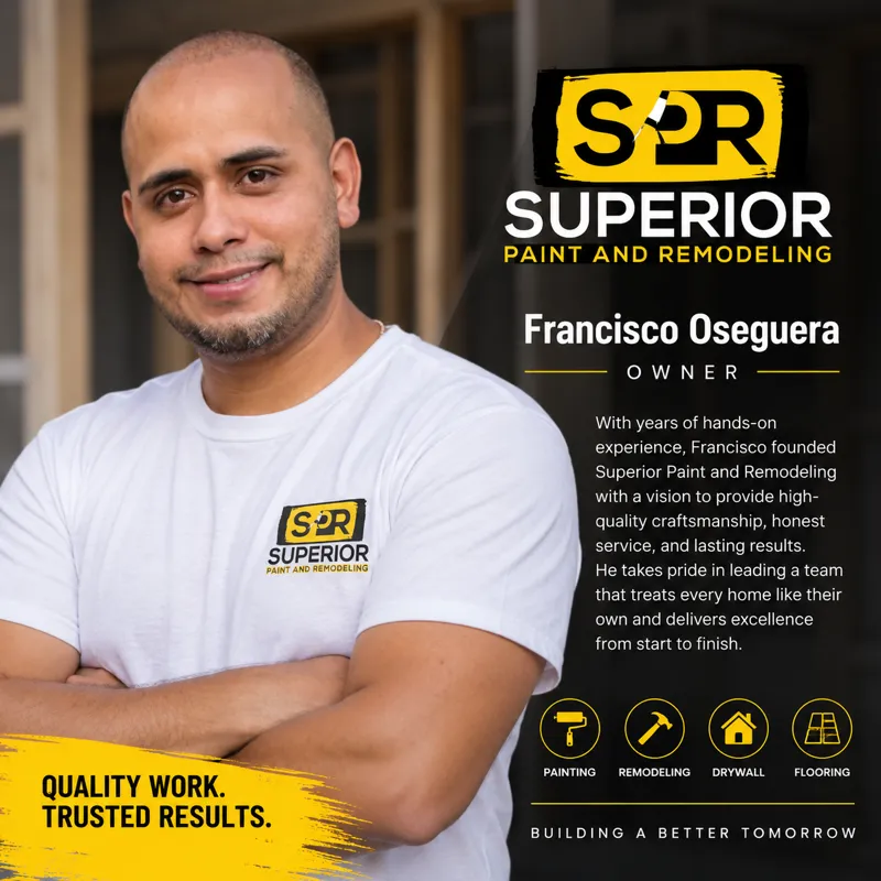 Portrait of Francisco Oseguera, owner and founder of Superior Paint and Remodeling LLC, standing with his arms crossed in a branded company shirt.